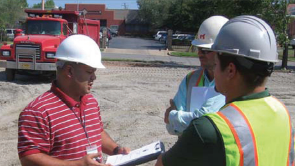 Three city officials talking